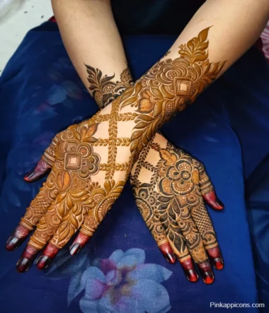 Mehndi Design Arabic Back Hand Intricate Arabic mehndi design adorning the back of a hand, featuring floral and geometric patterns in dark henna.