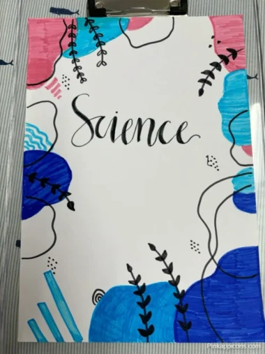 Colorful front cover of a science notebook featuring a vibrant design and decorative elements.