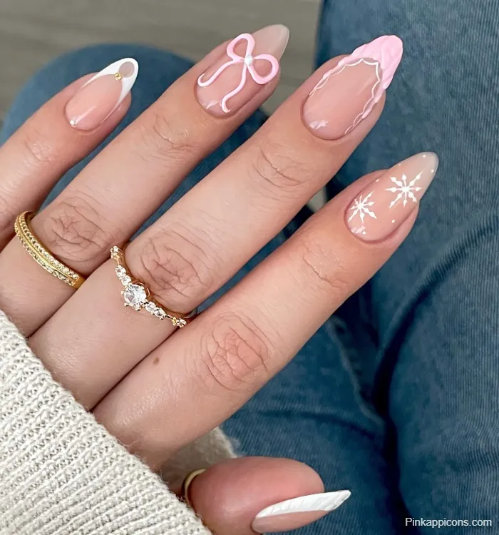 Almond Nails Delicate Pink and White Winter Nail Art with Snowflakes and Bow