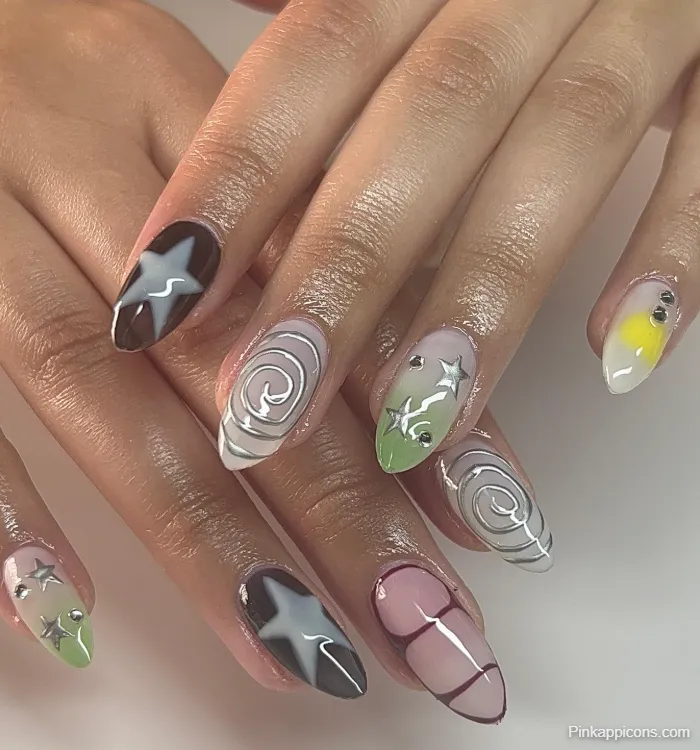 Almond Nails Trendy Mismatched Nail Art with Stars, Swirls, and Abstract Designs