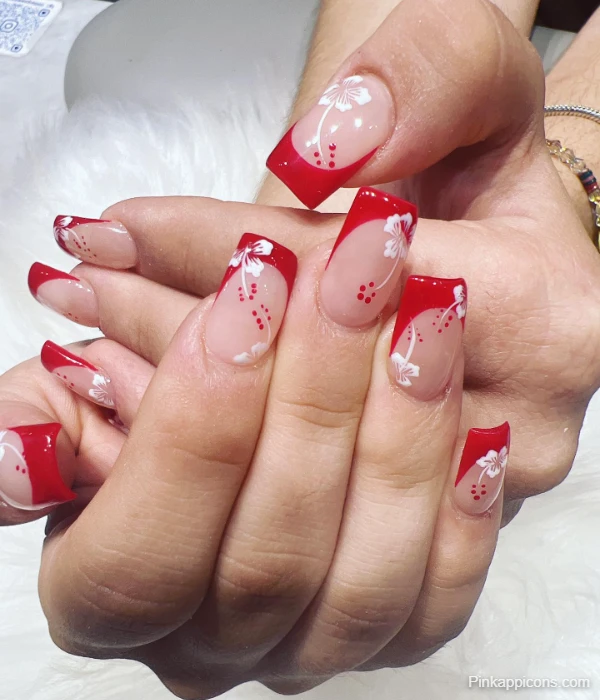 Elegant Red and White French Tip Nails with Delicate White Flowers