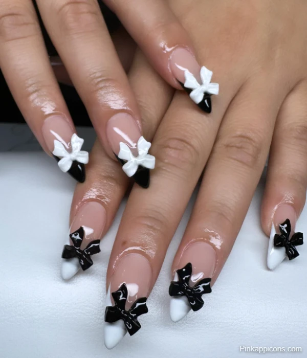 Elegant White French Tip Nails with 3D Black and White Bows