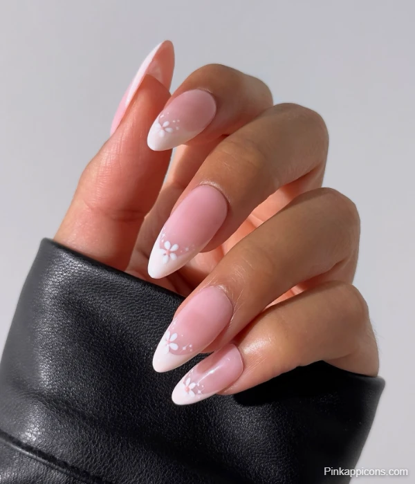 Elegant White French Tip Nails with Delicate Floral Accents