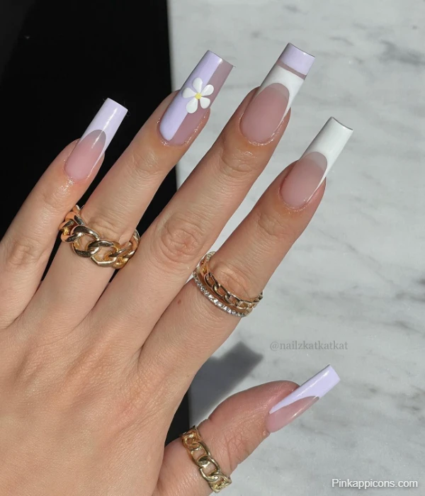 Elegant White French Tip Nails with Lilac and White Daisy Accent