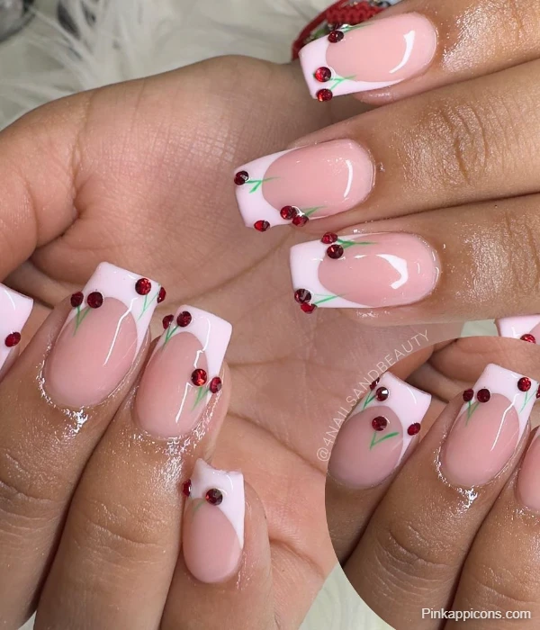 Elegant White French Tip Nails with Red Gem Cherry Accents