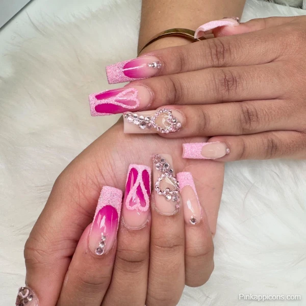 Glamorous Cute Pink Nails with Glitter, Hearts, and Rhinestones