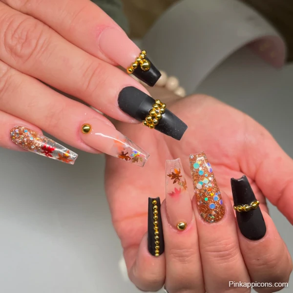 Glamorous Fall Nails Mixed Texture with Glitter, Matte Black, and Leaf Accents