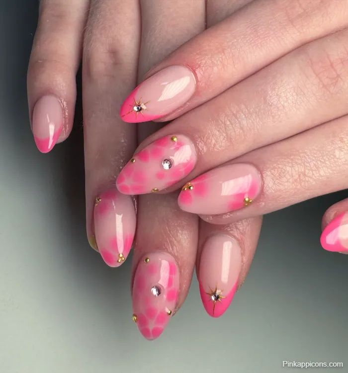 Pink Nails Almond Shape with Pink Floral Art, Gold Studs, and Rhinestones