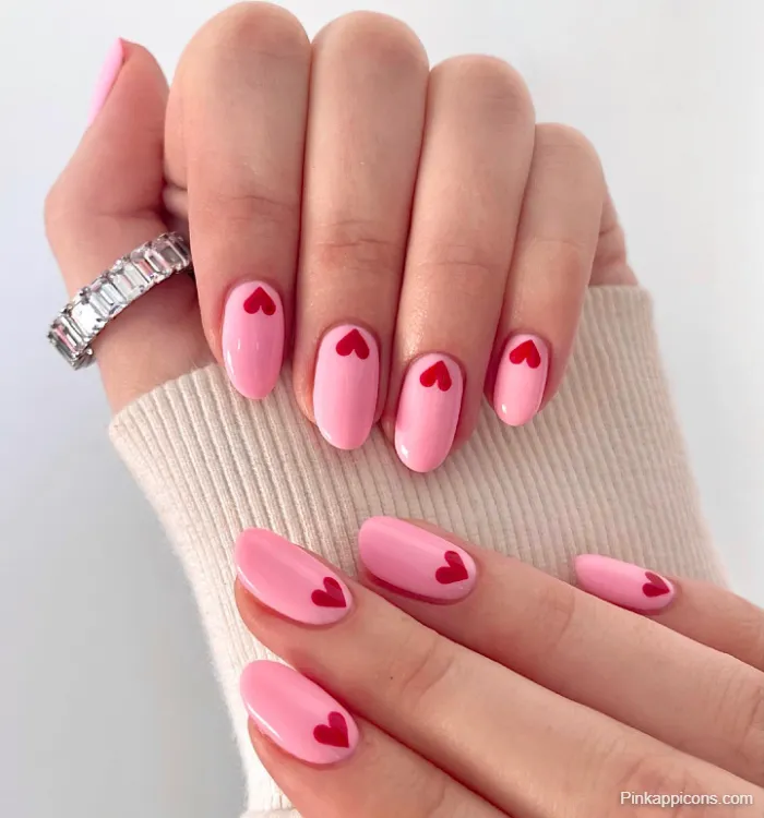 Pink Nails Light Pink with Delicate Red Heart Nail Art and Eternity Ring