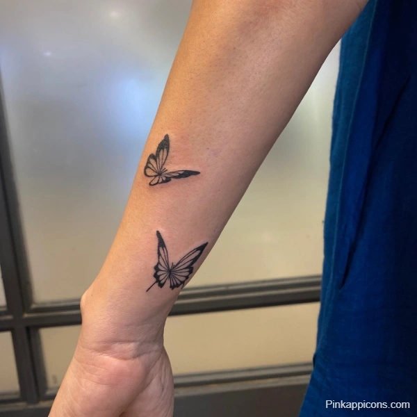 Small Butterfly Tattoo Idea Delicate Outline on Forearm