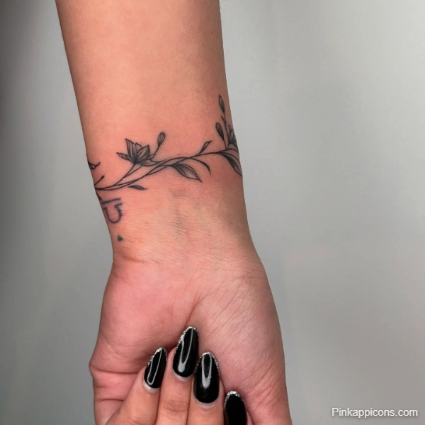 Small Floral Wristband Tattoo Idea Delicate Botanical Design