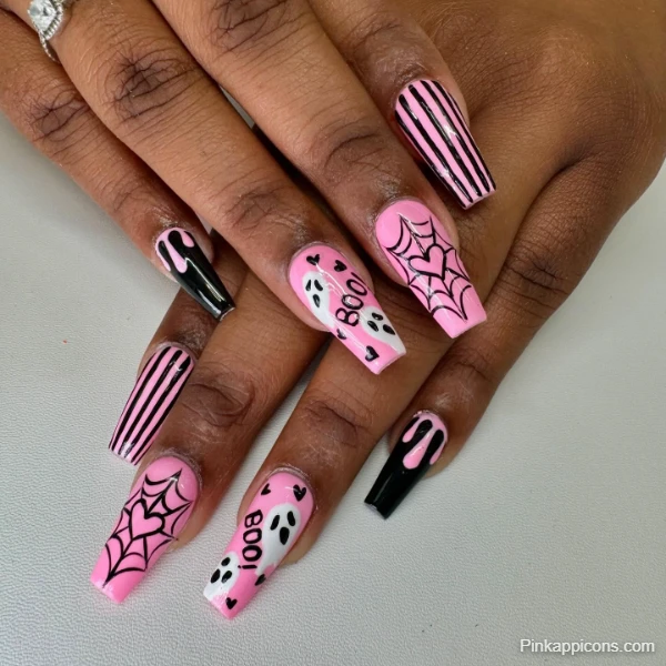 Spooky Cute Pink Nails Halloween Theme with Ghosts, Webs, and Stripes