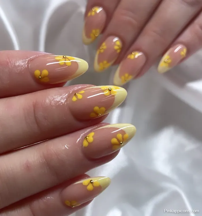 Spring Nails Yellow French Tip with Gold Daisy Nail Art