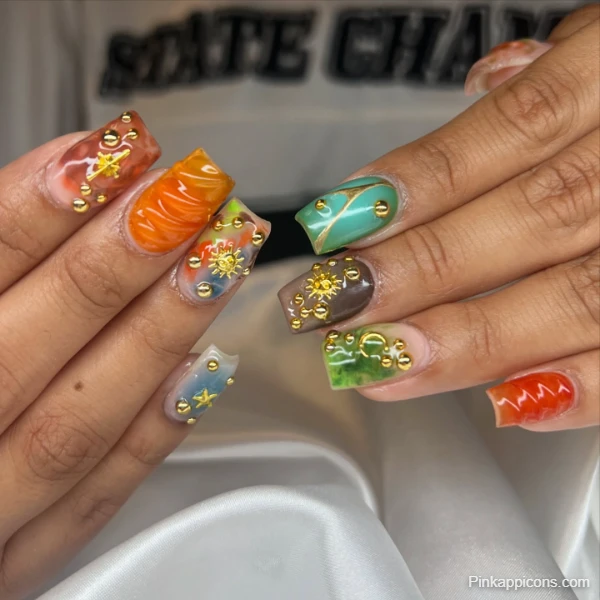 Unique Fall Nails Colorful Abstract Nail Art with Gold Studs and Star Accents