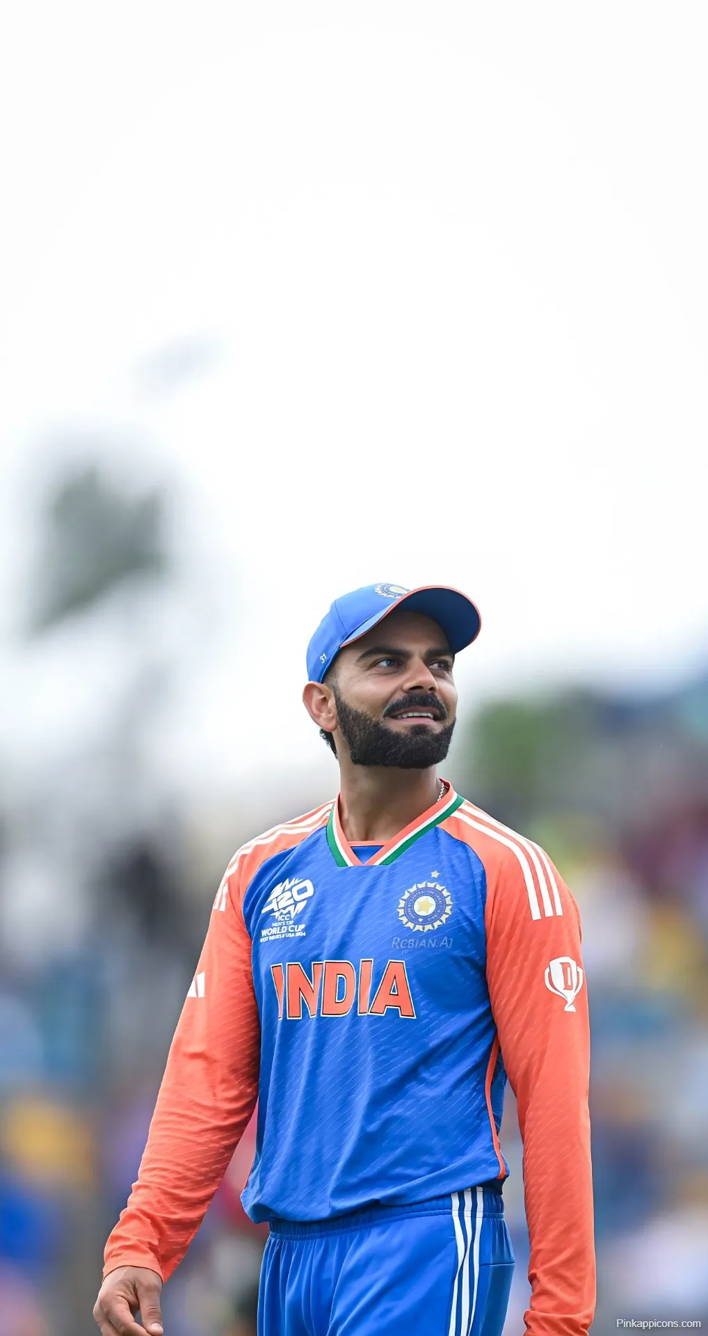 Virat Kohli Smiling Sideways Wallpaper Focused Indian Cricket Star
