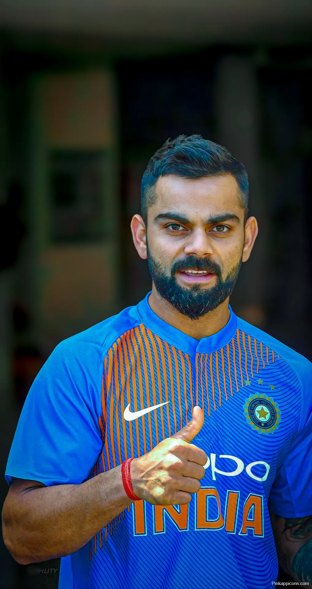 Virat Kohli Thumbs Up Wallpaper Cheerful Indian Cricket Star