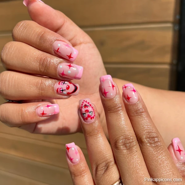 Whimsical Cute Pink Nails with Abstract Face and Star Design