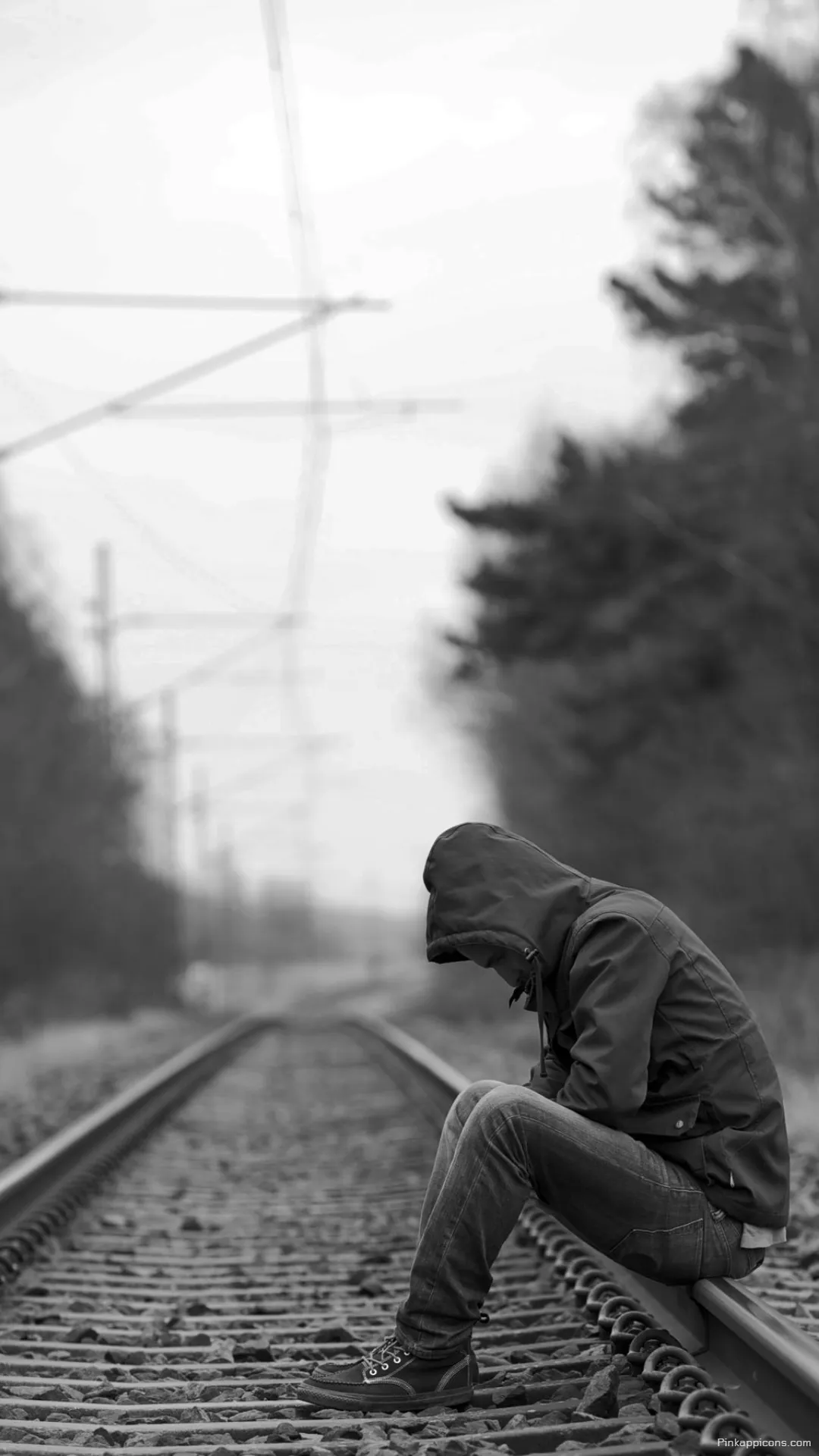 A Sad Wallpaper of Solitude A Person Sits Alone on the Railroad Tracks in a Fog A Sad Wallpaper of Solitude A Person Sits Alone on the Railroad Tracks in a Fog