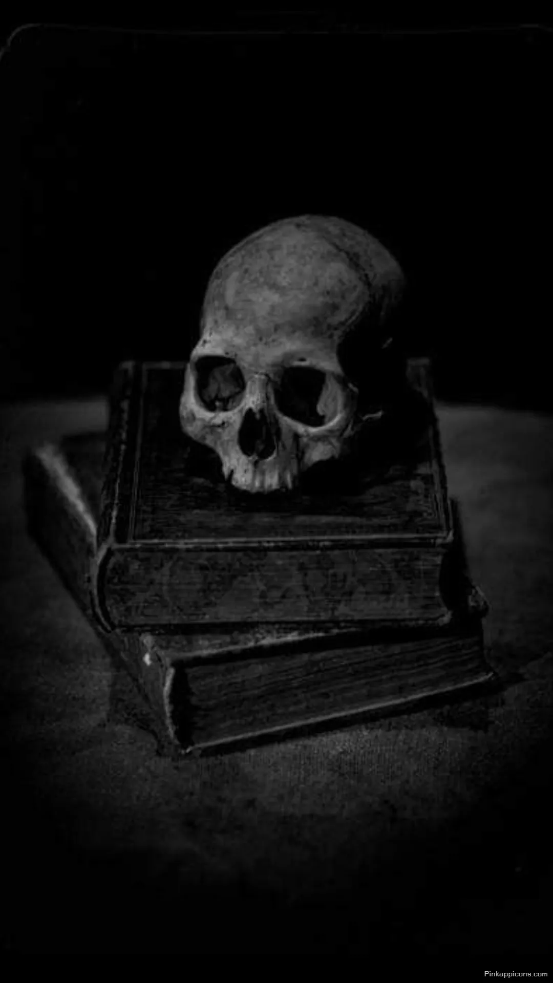 A Skull Wallpaper of a Skeleton on a Pile of Books for a Moody Vibe A Skull Wallpaper of a Skeleton on a Pile of Books for a Moody Vibe