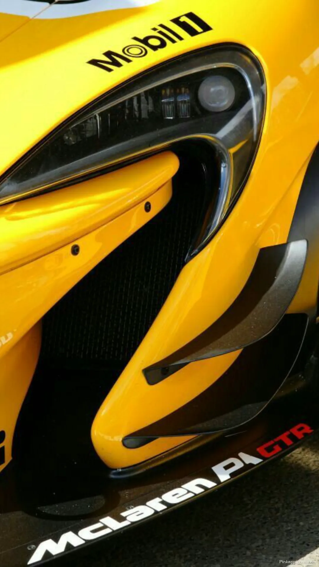 Dynamic McLaren Wallpaper Close up of Yellow Supercar Front with Racing Branding for Mobile Dynamic McLaren Wallpaper – Close-up of Yellow Supercar Front with Racing Branding for Mobile