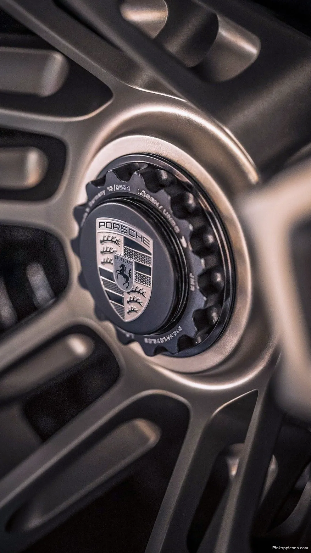 Experience Precision Engineering with This Porsche Center Lock Wheel Porche Wallpaper for Mobile Experience Precision Engineering with This Porsche Center Lock Wheel Porche Wallpaper for Mobile