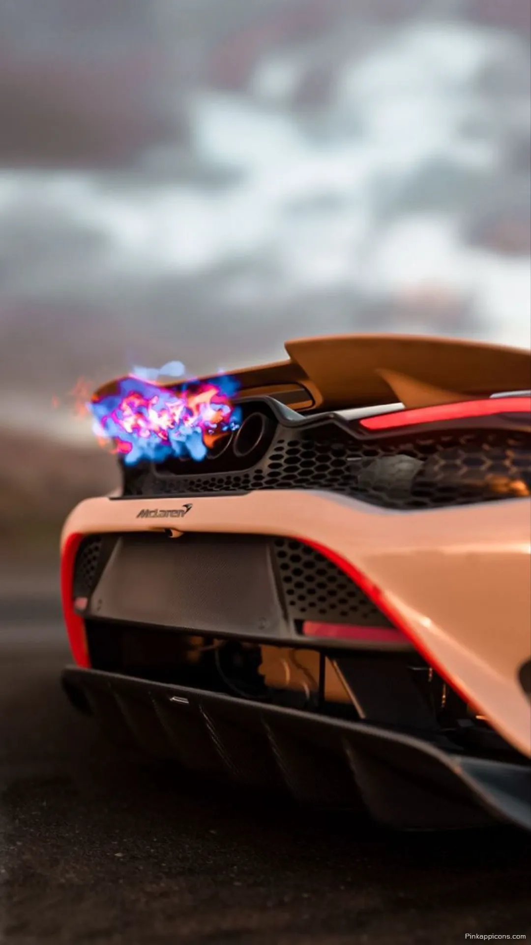 Fiery Exhaust McLaren Wallpaper Dynamic Sports Car with Blue Flames for Phone Background Fiery Exhaust McLaren Wallpaper – Dynamic Sports Car with Blue Flames for Phone Background
