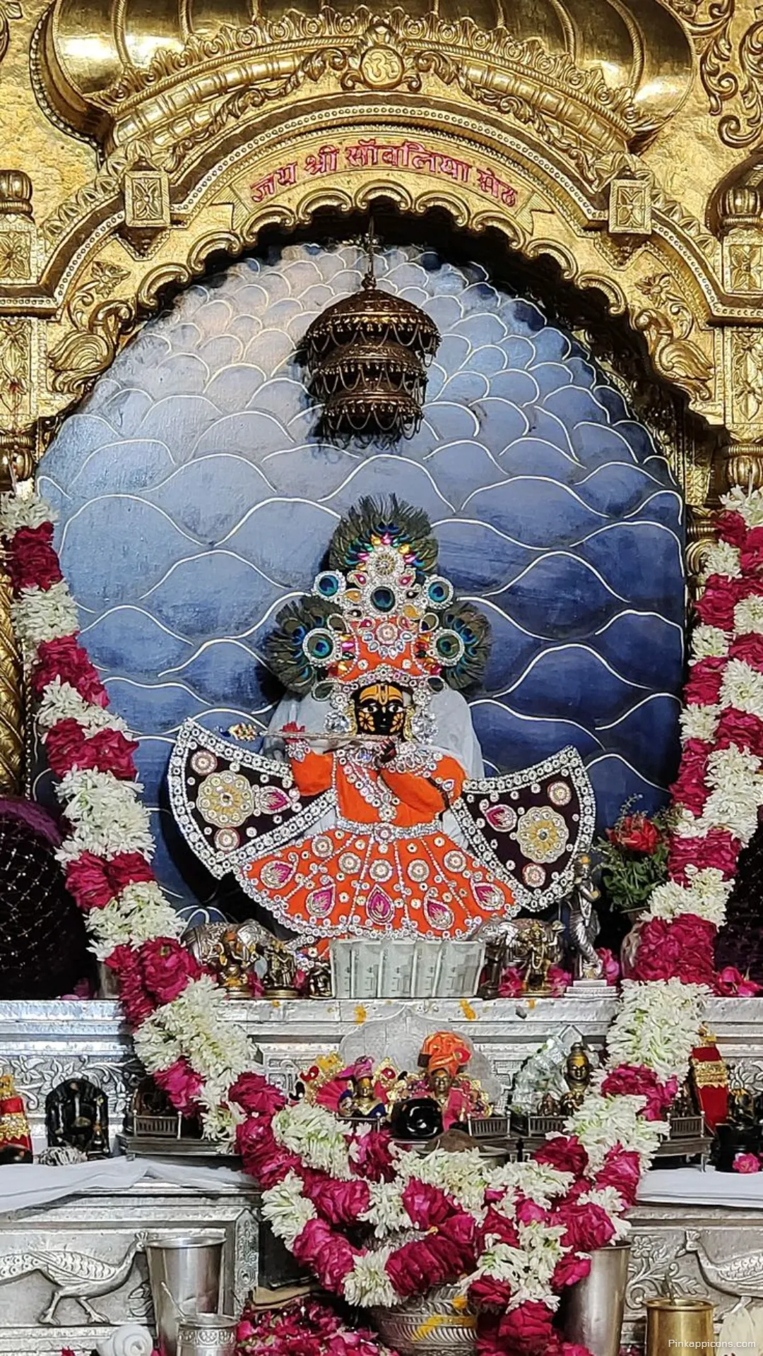 Golden Archway Frames Ornate Temple Setting with Floral Garlands a Beautiful Khatushyam Ji Wallpaper Golden Archway Frames Ornate Temple Setting with Floral Garlands, a Beautiful Khatushyam Ji Wallpaper