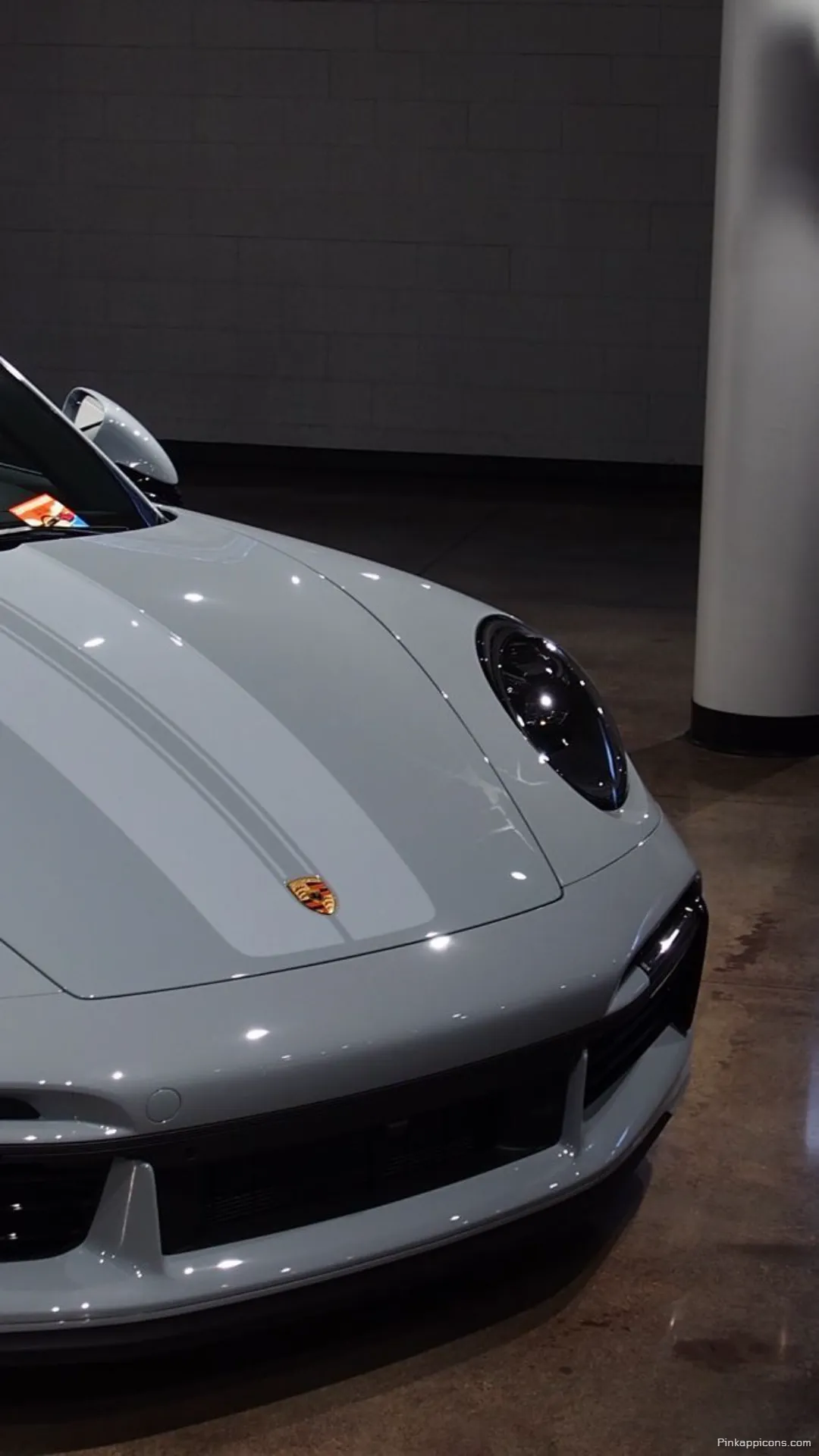 Modern Porsche 911 in a Showroom Setting A Minimalist Porche Wallpaper for Mobile Modern Porsche 911 in a Showroom Setting A Minimalist Porche Wallpaper for Mobile