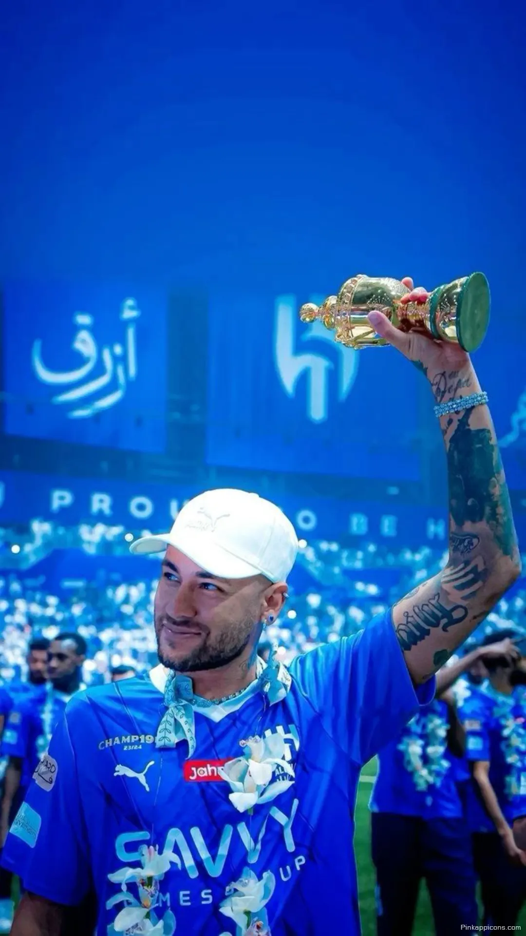Neymar Wallpaper A high quality photo of Neymar Jr. celebrating with a trophy perfect for your phone wallpaper Neymar Wallpaper A high-quality photo of Neymar Jr. celebrating with a trophy, perfect for your phone wallpaper.