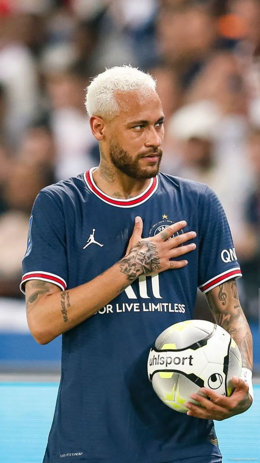 Neymar Wallpaper A high quality photo of Neymar Jr. with the ball and his hand on his chest perfect for your phone wallpaper Neymar Wallpaper A high-quality photo of Neymar Jr. with the ball and his hand on his chest, perfect for your phone wallpaper.