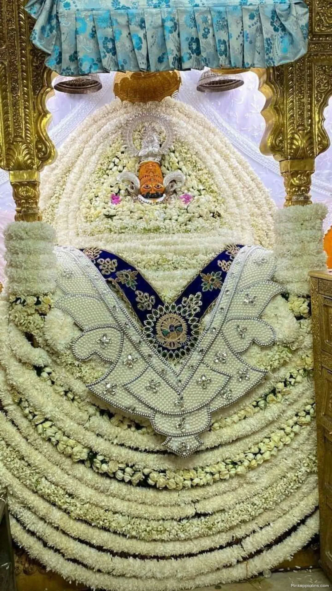 Sacred Splendor White Flowers and Jeweled Garments a Divine Khatushyam Ji Wallpaper for Your Phone Sacred Splendor White Flowers and Jeweled Garments, a Divine Khatushyam Ji Wallpaper for Your Phone