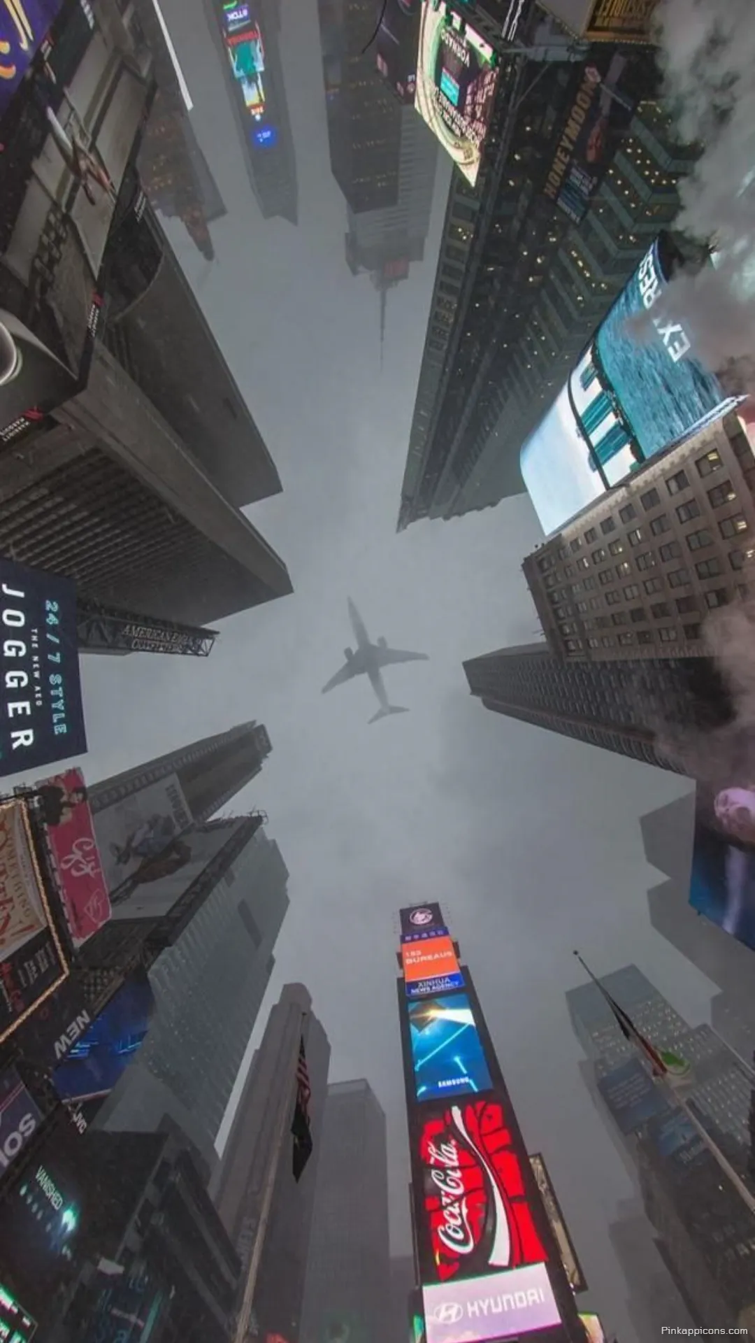 Simple Wallpaper Airplane Flying Above NYCs Times Square at Night Simple Wallpaper Airplane Flying Above NYC’s Times Square at Night