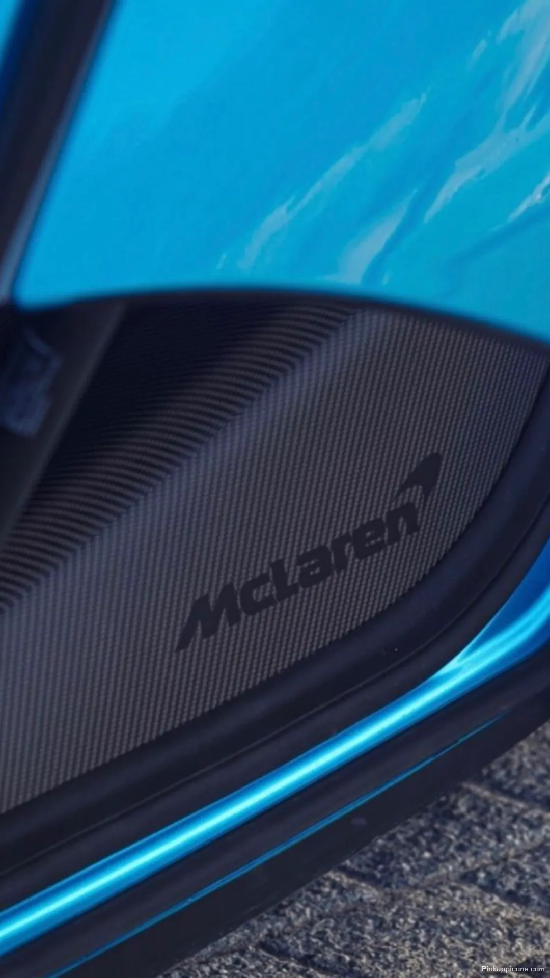 Sleek Blue McLaren Wallpaper with Carbon Fiber Interior Detail Modern Sports Car Phone Background Sleek Blue McLaren Wallpaper with Carbon Fiber Interior Detail – Modern Sports Car Phone Background
