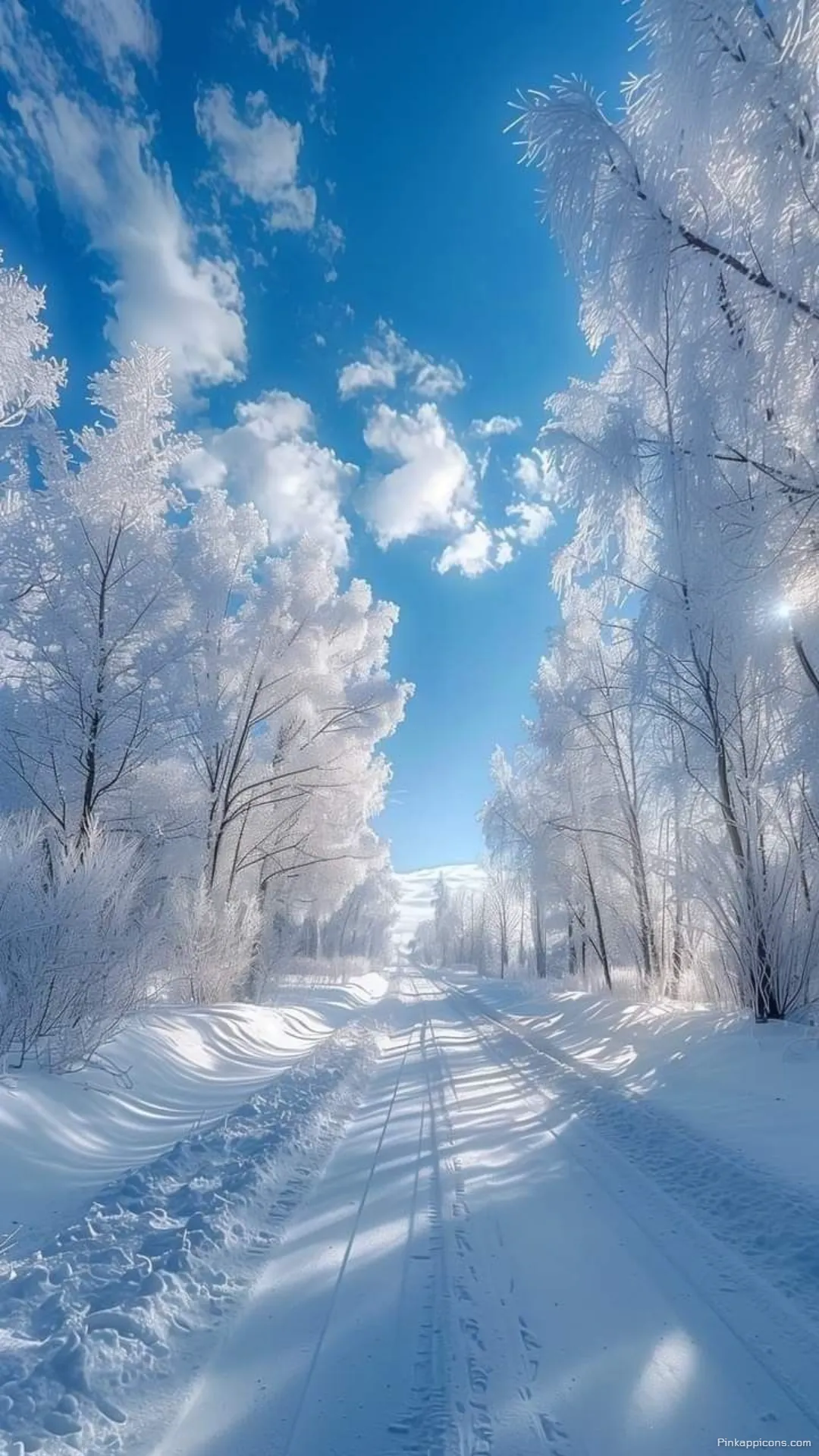Snow Wallpaper A beautiful view of a bright snowy road with a blue sky perfect for your phone wallpaper Snow Wallpaper A beautiful view of a bright snowy road with a blue sky, perfect for your phone wallpaper.