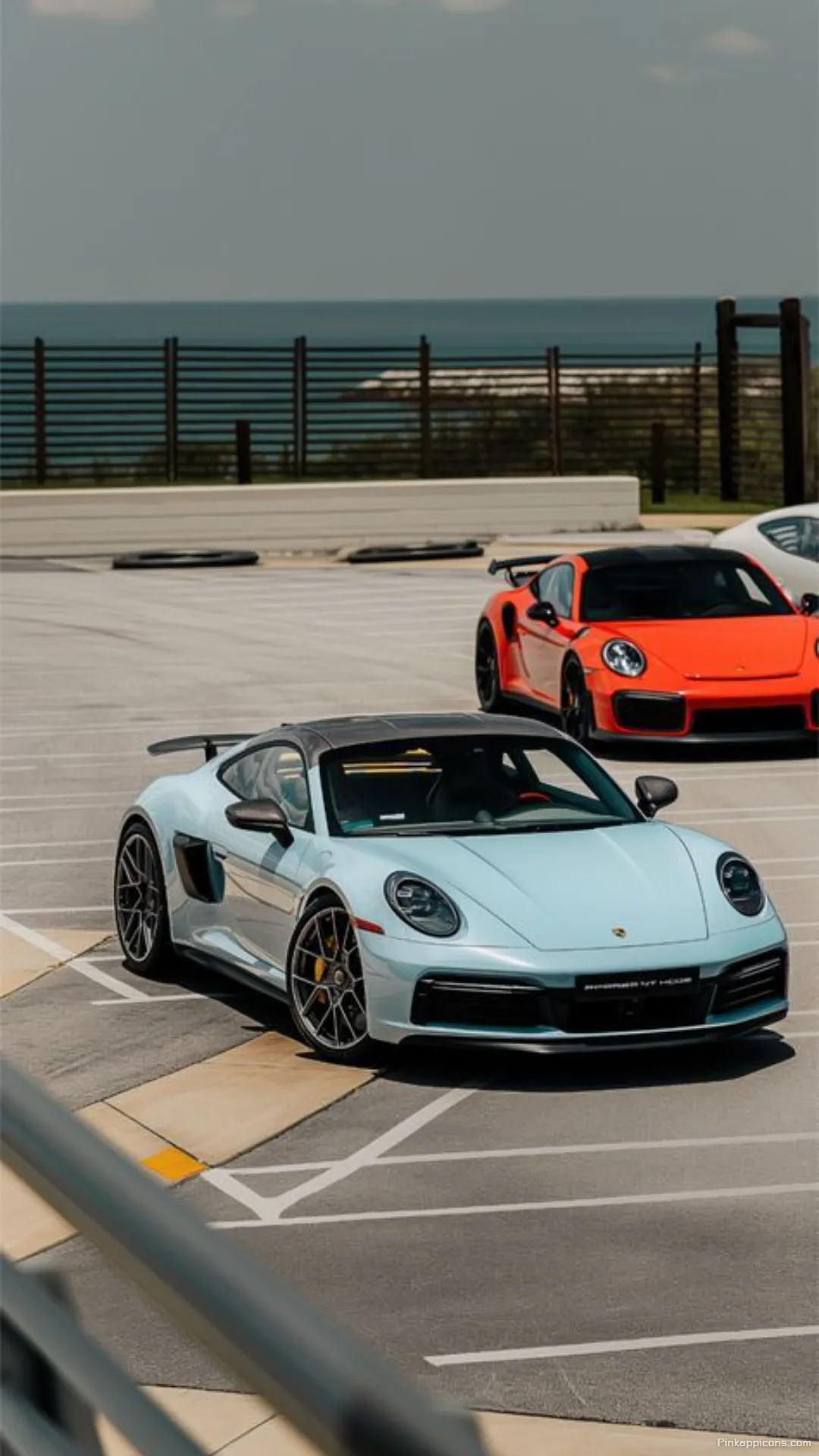 Stunning Duo A Blue Porsche 911 and an Orange GT2 RS Porche Wallpaper for your screen Stunning Duo A Blue Porsche 911 and an Orange GT2 RS Porche Wallpaper for your screen