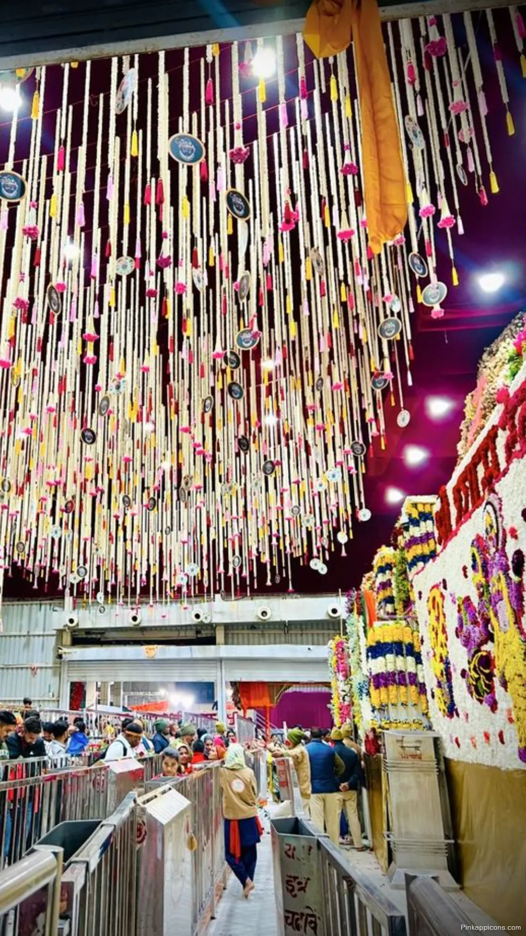 Vibrant Temple Decor Hanging Flowers Adorn this Sacred Khatushyam Ji Wallpaper for Your Phone Vibrant Temple Decor Hanging Flowers Adorn this Sacred Khatushyam Ji Wallpaper for Your Phone