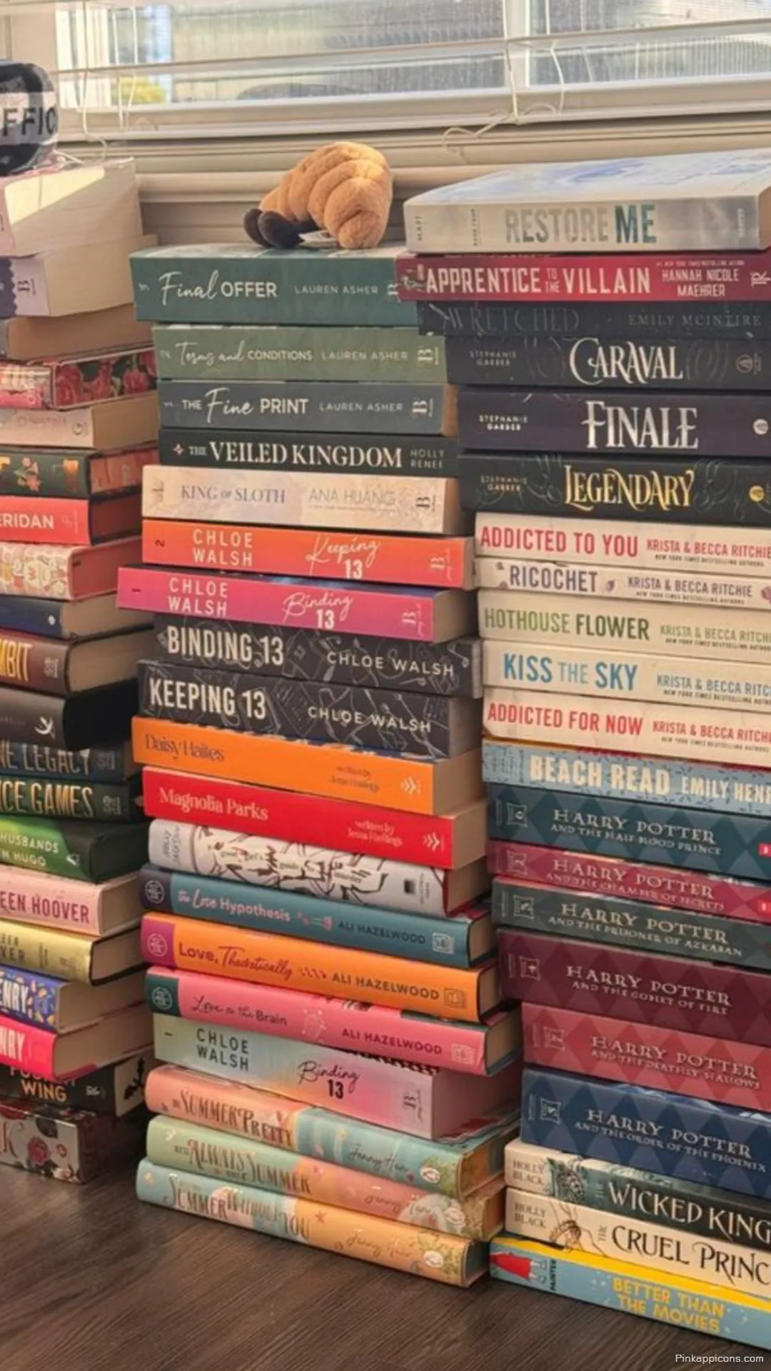 A book lovers dream book wallpaper with colorful stacks of popular fiction for your phone A book lover’s dream book wallpaper with colorful stacks of popular fiction for your phone
