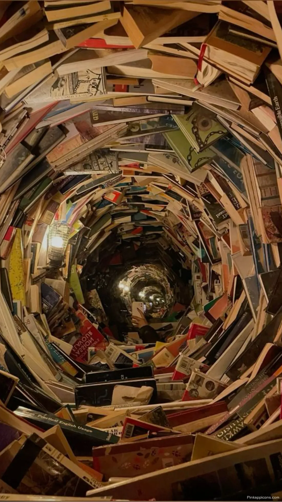 A mesmerizing book wallpaper of an infinite tunnel of stories a unique phone background A mesmerizing book wallpaper of an infinite tunnel of stories, a unique phone background.