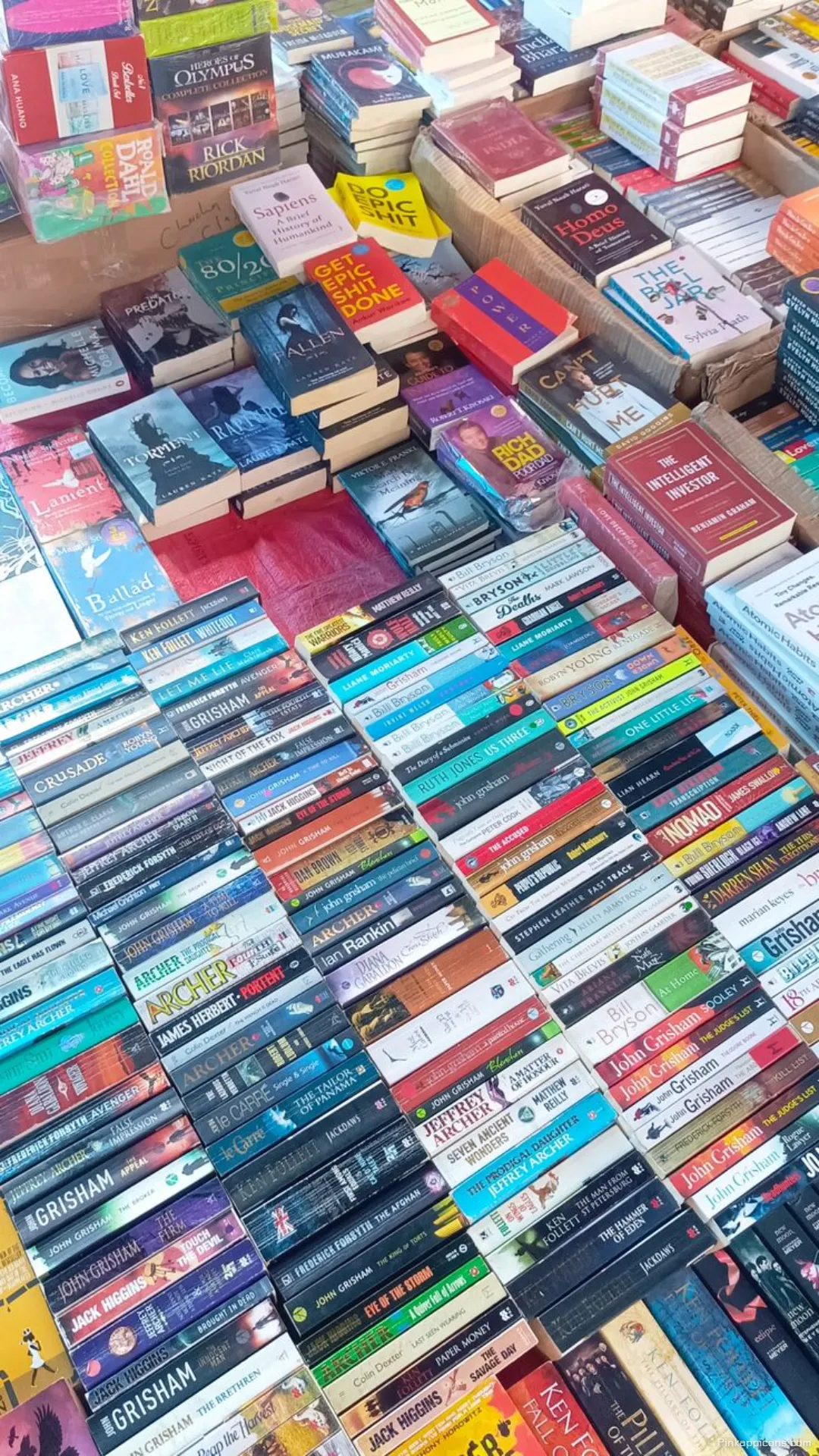 A readers paradise book wallpaper a vibrant and colorful street stall full of novels A reader’s paradise book wallpaper, a vibrant and colorful street stall full of novels.