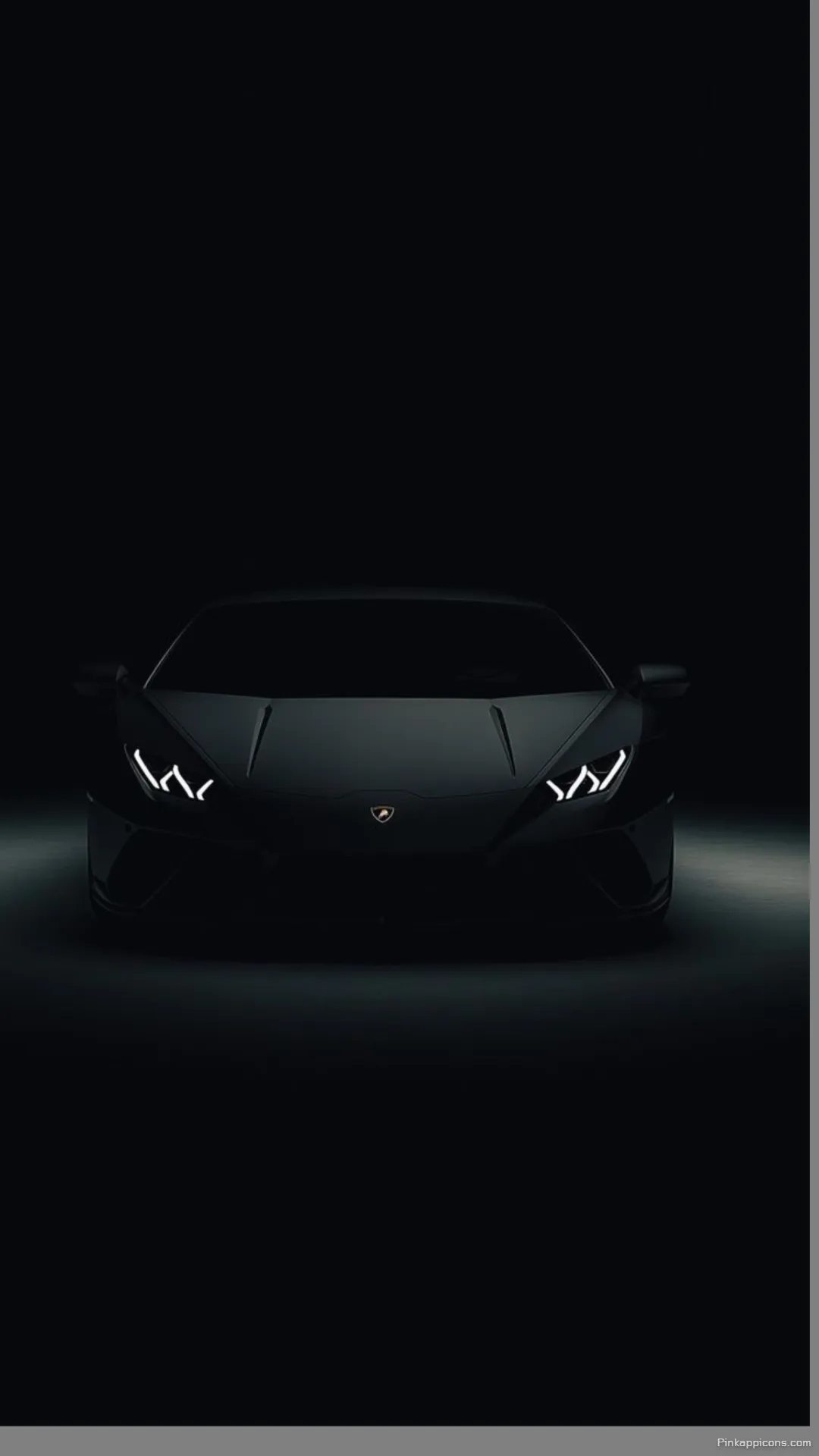 Luminous Headlights Lamborghini in the Dark wallpaper The supercars aggressive stare creates an elegant phone wallpaper Luminous Headlights Lamborghini in the Dark wallpaper The supercar’s aggressive stare creates an elegant phone wallpaper