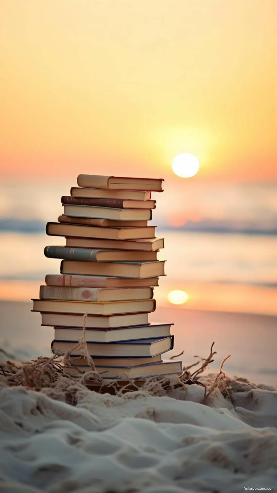 Perfect beach read book wallpaper with a stack of novels on the sand at sunset for your phone Perfect beach read book wallpaper with a stack of novels on the sand at sunset for your phone.