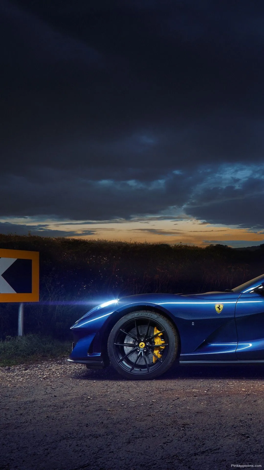 Powerful Blue Ferrari with Yellow Calipers wallpaper Striking luxury vehicle on a dramatic evening landscape perfect for your phone Powerful Blue Ferrari with Yellow Calipers wallpaper Striking luxury vehicle on a dramatic evening landscape, perfect for your phone