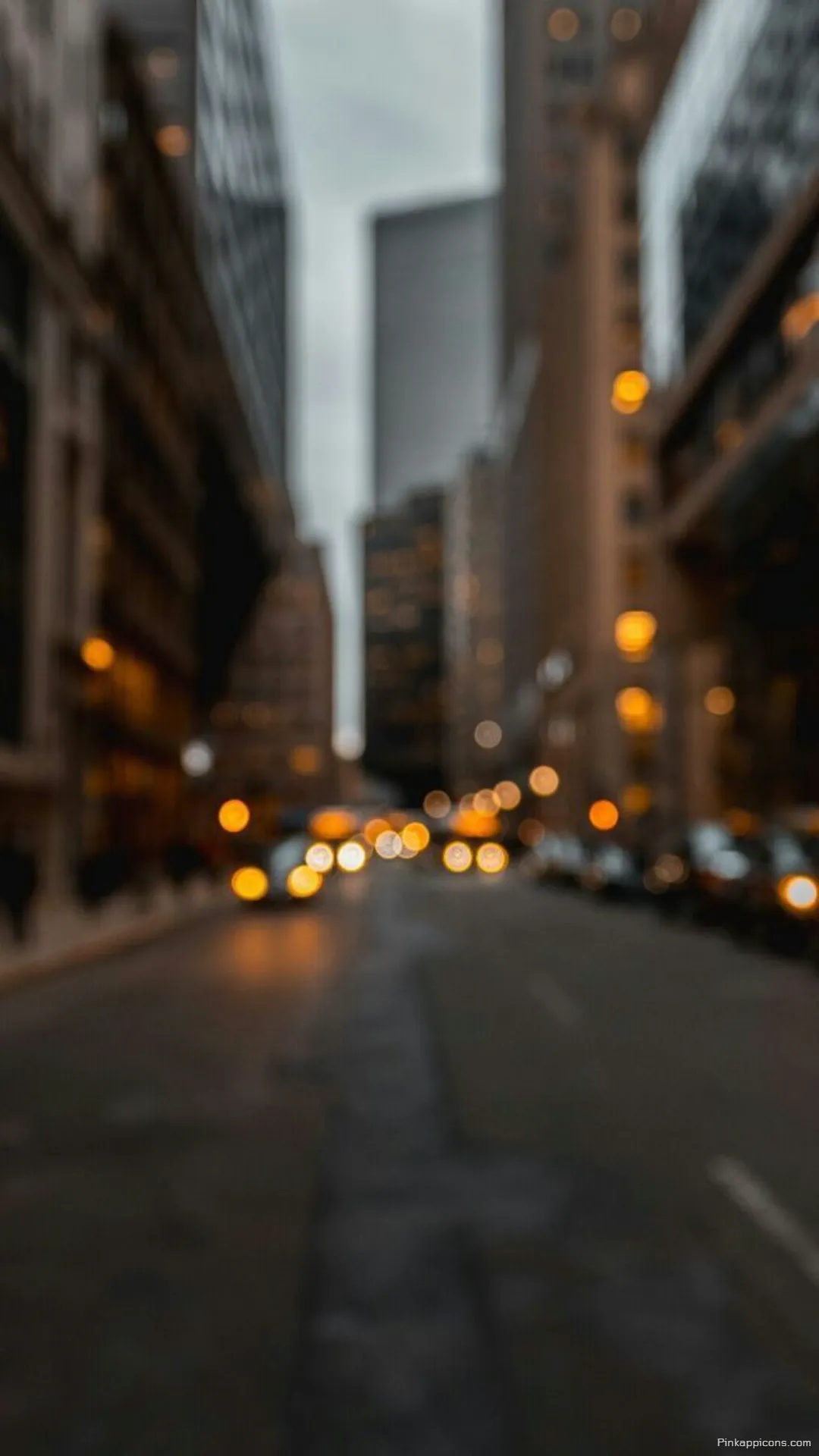 Urban Glow Blurry Wallpapers Defocused City Street with Warm Bokeh Lights Phone Wallpaper Urban Glow Blurry Wallpapers Defocused City Street with Warm Bokeh Lights Phone Wallpaper.