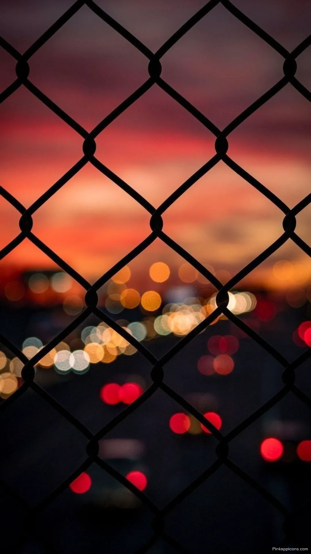Vibrant Sunset Blurry Wallpapers Behind Fence Urban City Lights Bokeh Phone Background Vibrant Sunset Blurry Wallpapers Behind Fence Urban City Lights Bokeh Phone Background.