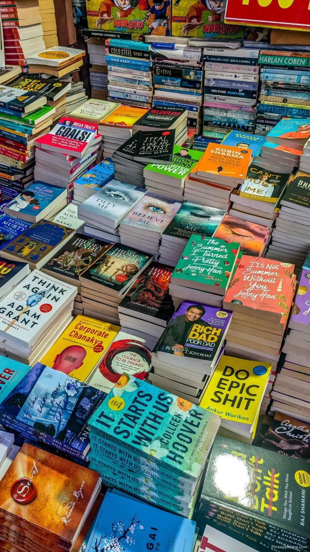 Vibrant book stall book wallpaper a readers paradise of novels for your phones screen Vibrant book stall book wallpaper, a reader’s paradise of novels for your phone’s screen.
